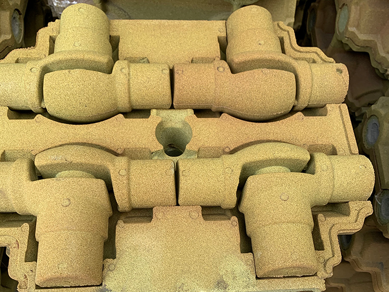 Hvordan løses sandpindedefekten i produktionen af grå støbejernsdele ved hjælp af filmbelagt sandteknologi?