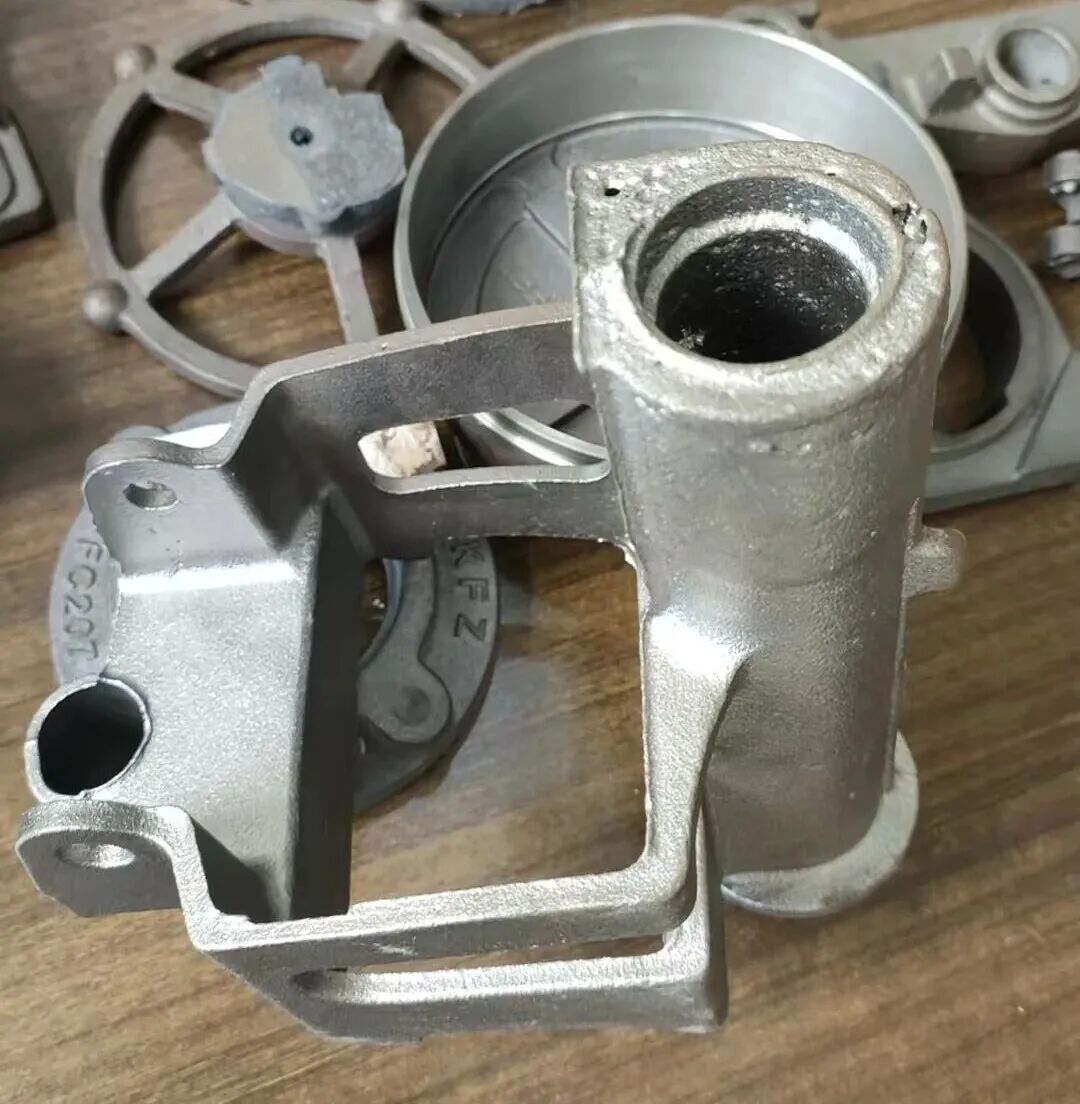 Behandling for svær porøsitet i cylindriske rørformede sandkerner under produktion af duktile jerndele ved brug af grøn sandstøbningsteknologi